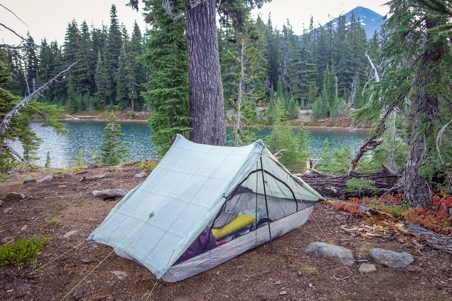 The Zpacks Duplex Tent in front of a lake in the Three Sisters Wilderness.