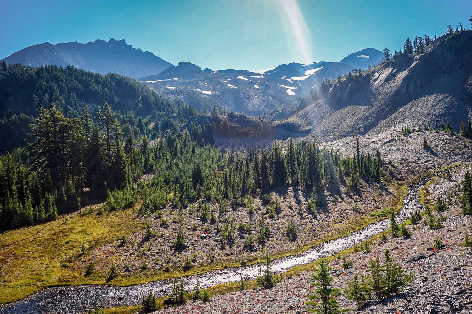 The view down on a river surrounded by granite cliffs in the Three Sisters Wilderness