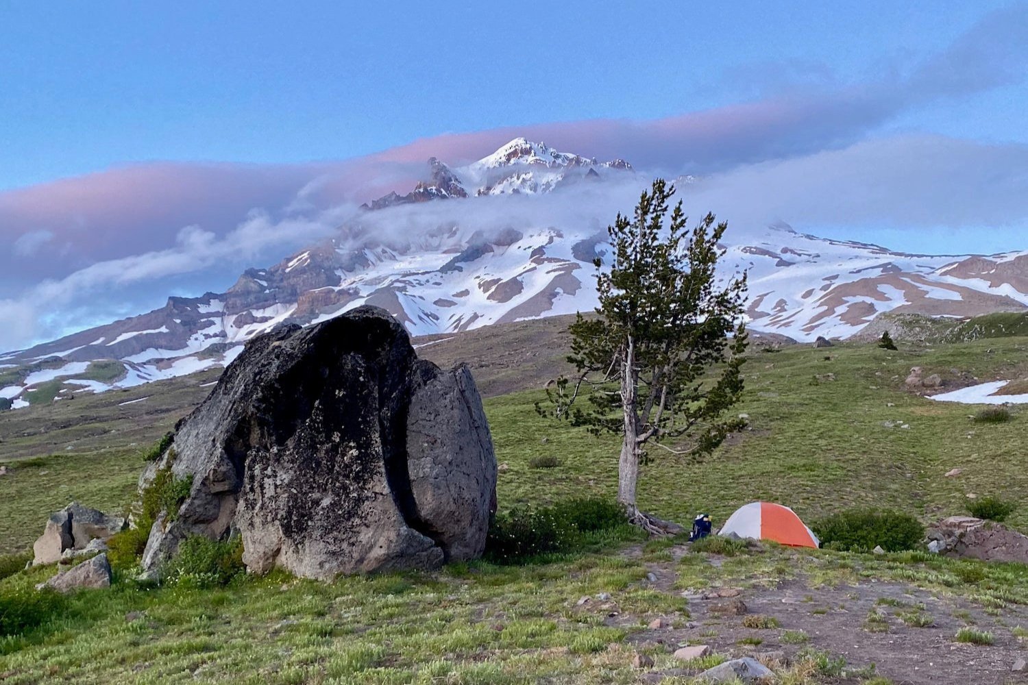 The Big Agnes Copper Spur HV UL2 backpacking tent near a giant split boulder at the base of Mt. Hood