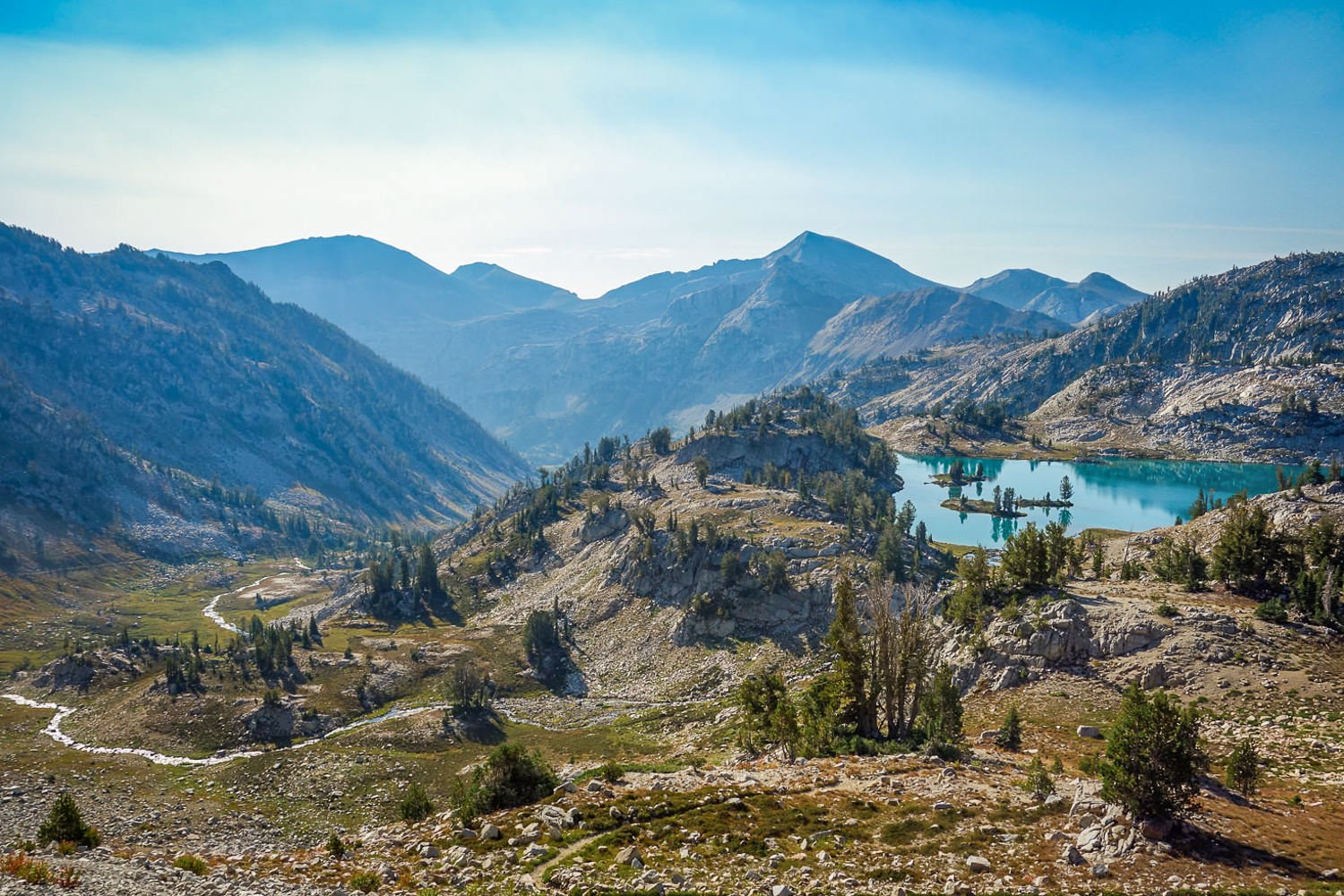 A high lake nestled in a basin in the Wallowa Mountains