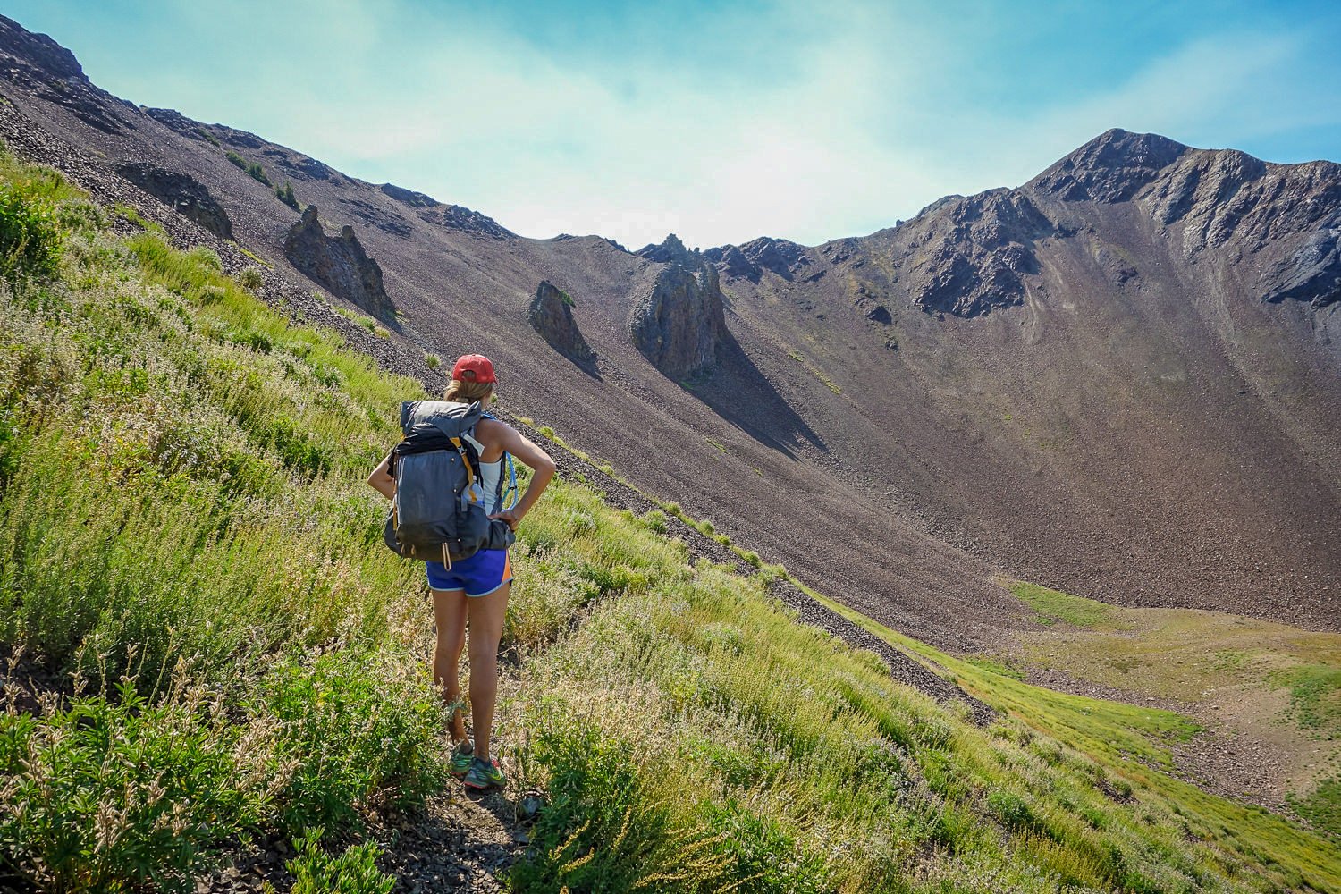 A backpacker approaching Polaris Pass on the Wallowa River Loop Trail