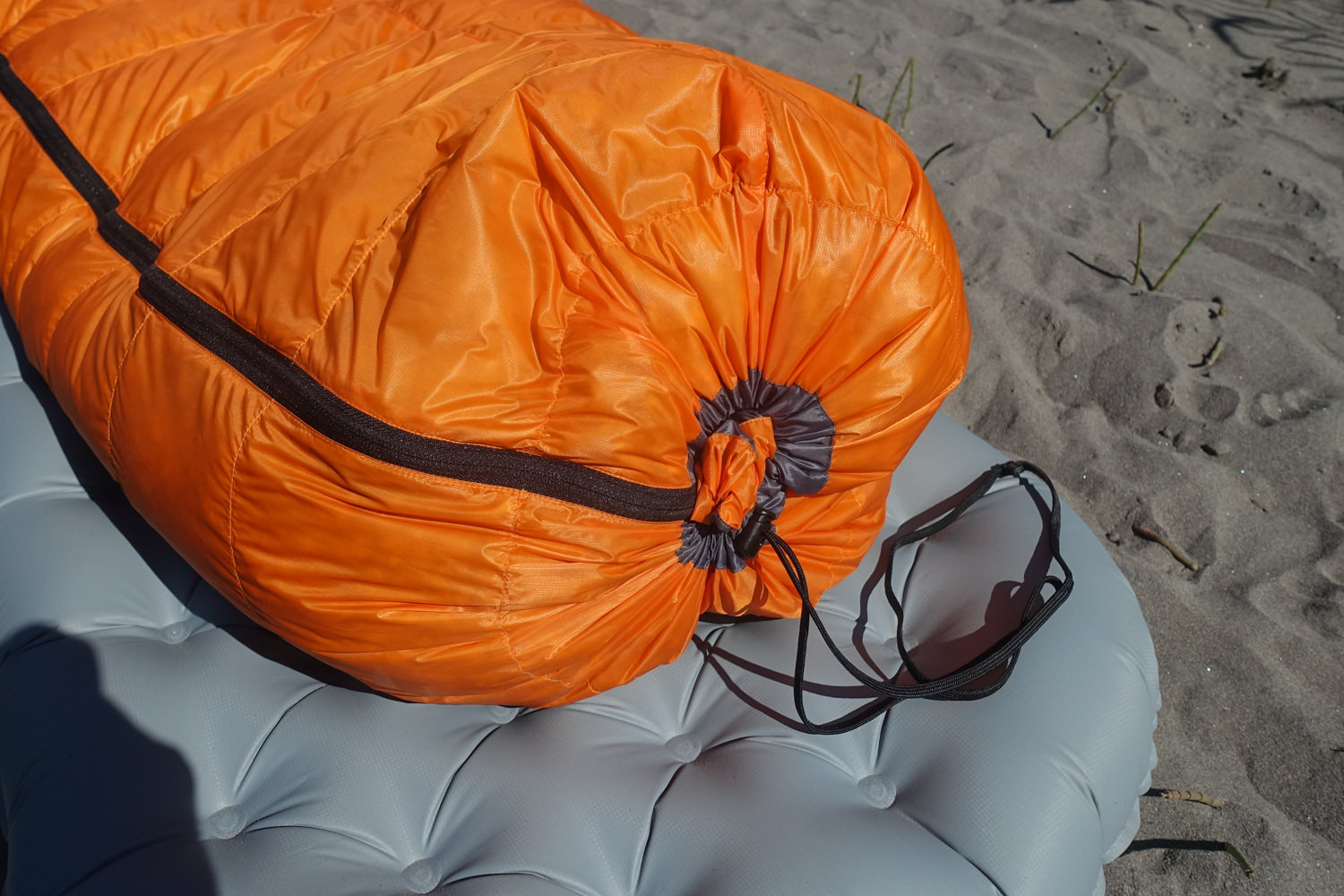 For colder nights, you can zip the bag and cinch the bottom to make an enclosed footbox.