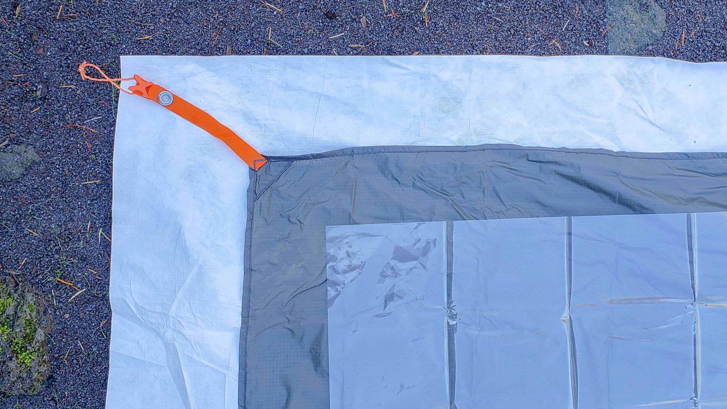 Bottom to top Layer: Left to right: Tyvek, tent footprint for copper spur, & Polycryo
