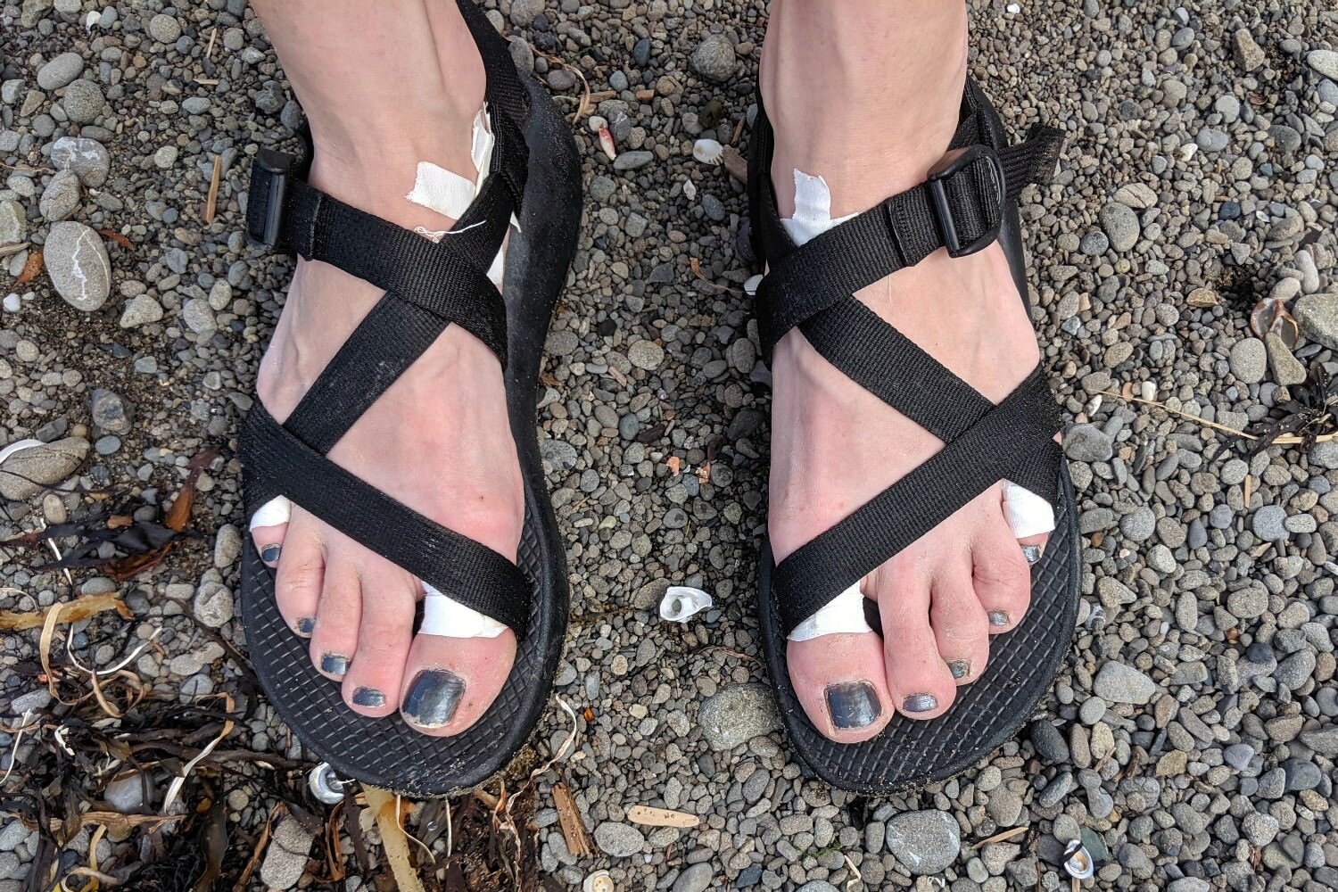 Taped feet to prevent blisters_ Olympic coast.jpeg