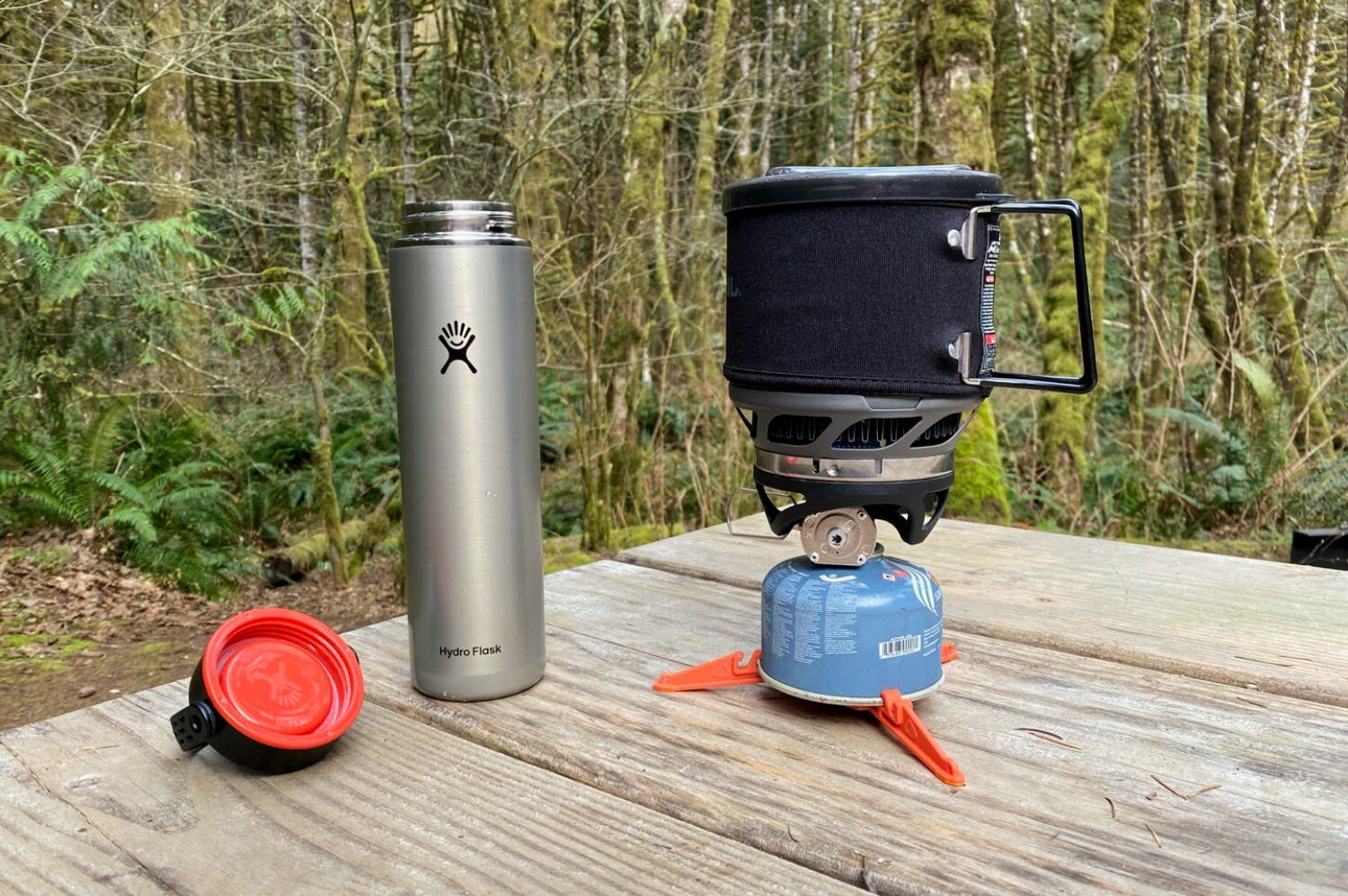 Boiling water in the Jetboil Minimo Integrated Canister Stove System while camping in the Pacific Northwest to make hot tea in the Hydro Flask Lightwe.jpeg