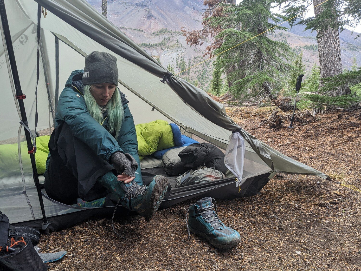 Keep your rain jacket, rain pants, and shelter somewhere you can access them quickly without having to expose your dry stuff when you expect rain.