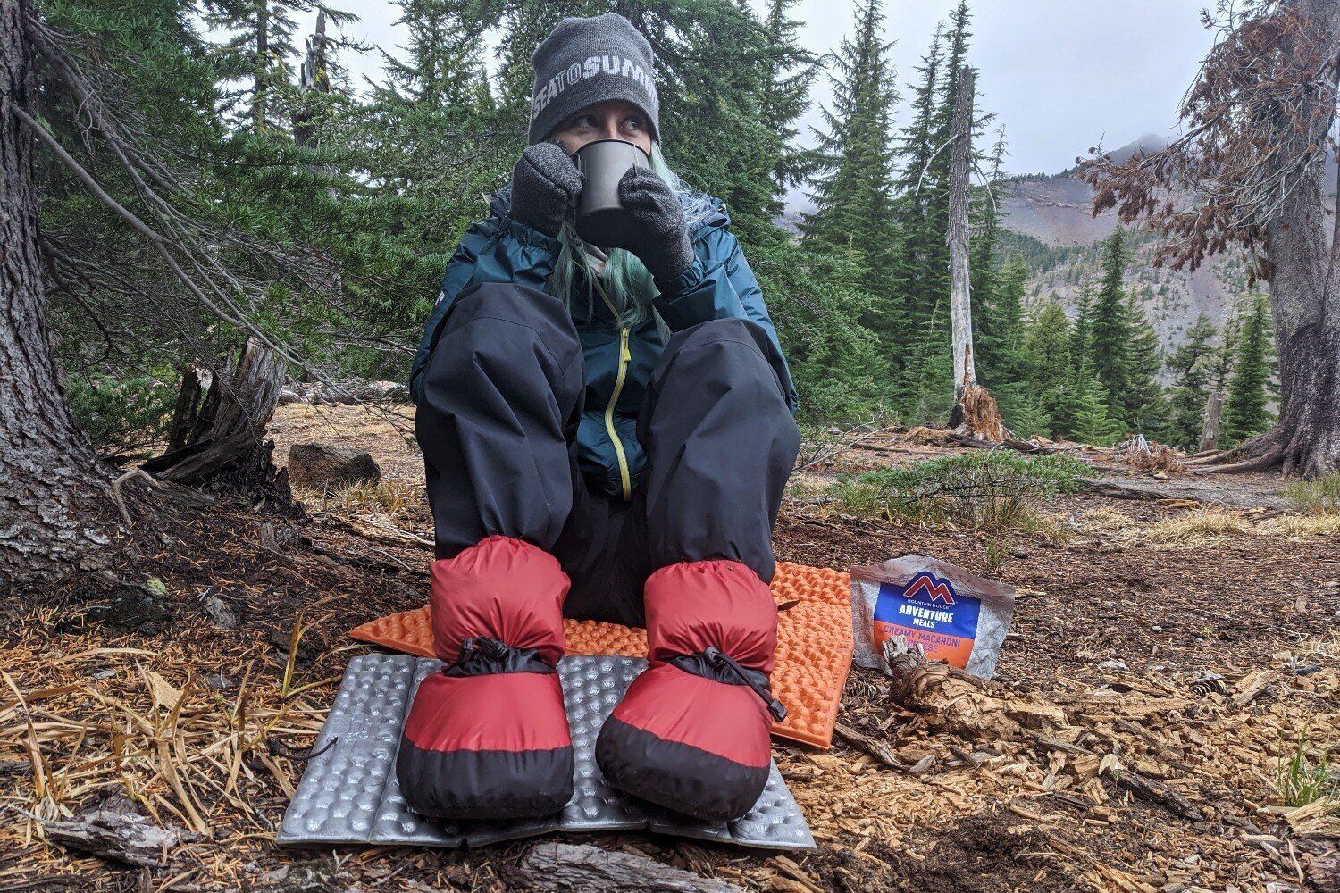 The Feathered Friends Down Booties are a comfy reprieve from your boots while in camp & they can be worn in your sleeping bag to boost warmth.