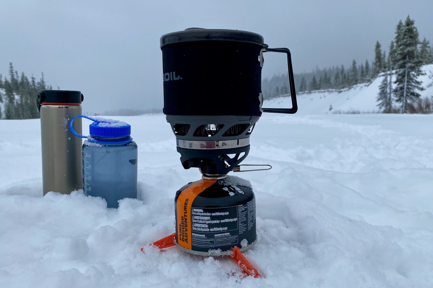 A durable plastic water bottle, like a Nalgene, can be filled with boiling water to heat your sleeping bag.