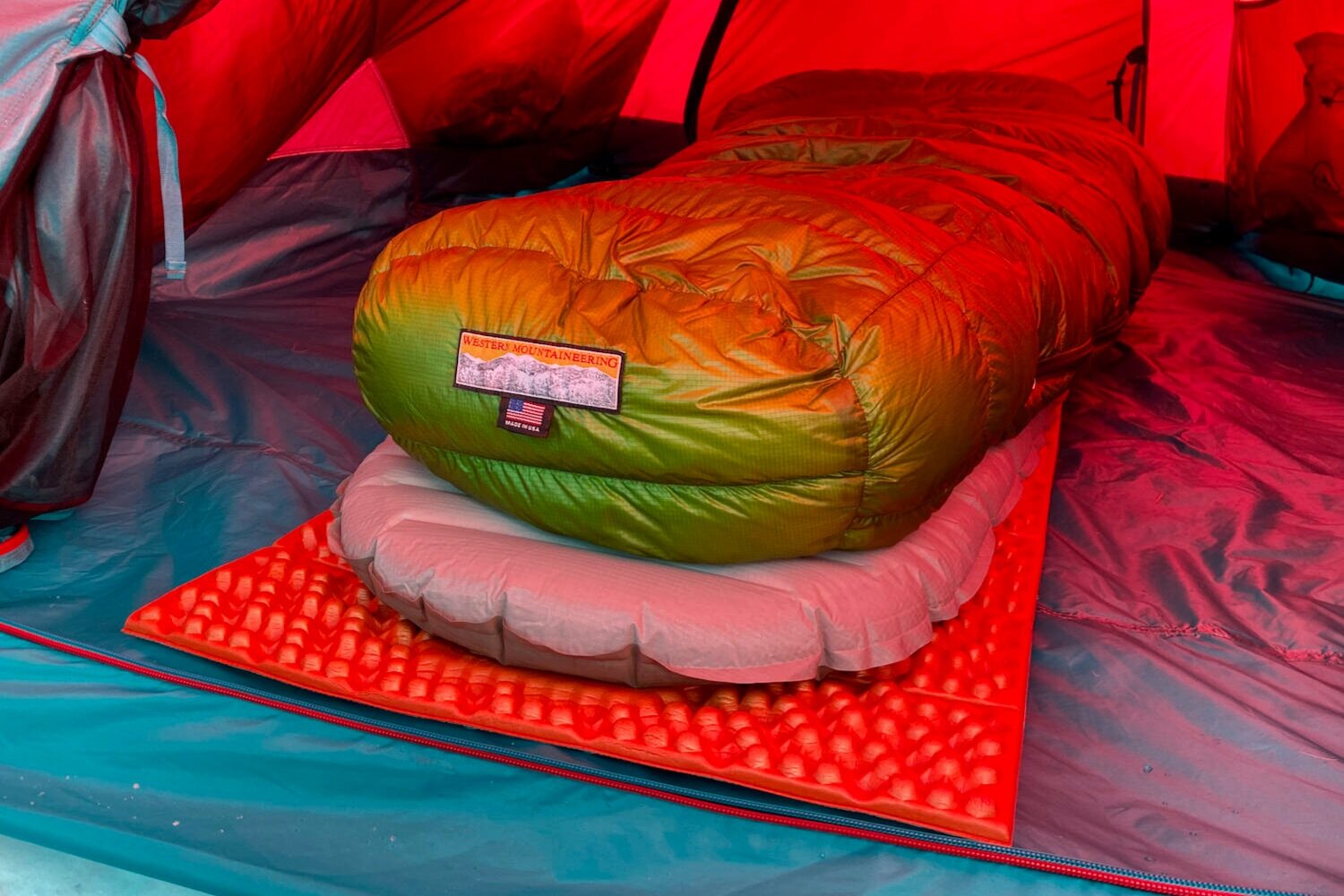 The Western Mountaineering Versalite 10F Sleeping bag along with the Therm-a-Rest NeoAir Xtherm & NEMO Switchback sleeping pads make the perfect winter camping sleep system.