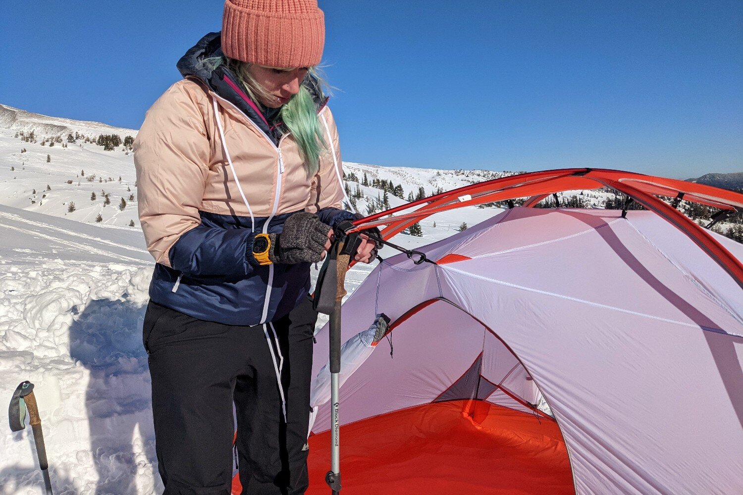 Attaching trekking poles to the Outrigger attachments provides more strength in harsh weather.