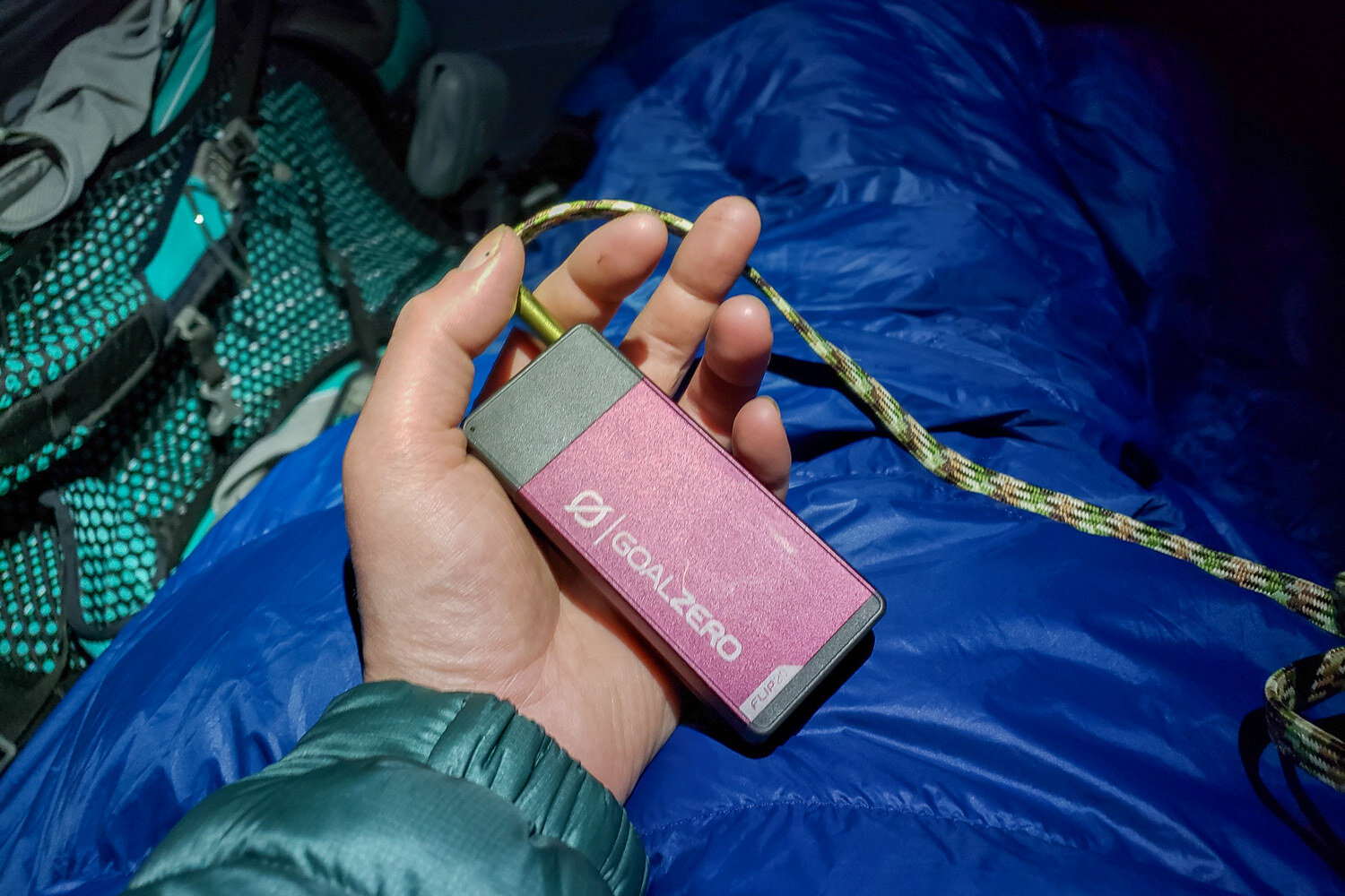 A portable power bank, like the Goal Zero Flip, will keep your phone & electronics juiced up while backpacking.