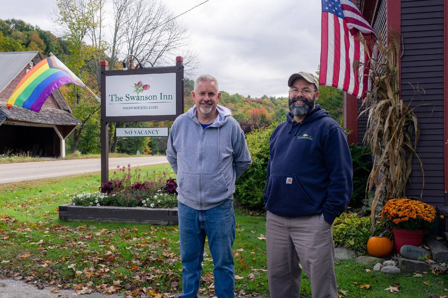 Owners Tim and Rick with the Swanson Inn sign in Waitsfield Vermont
