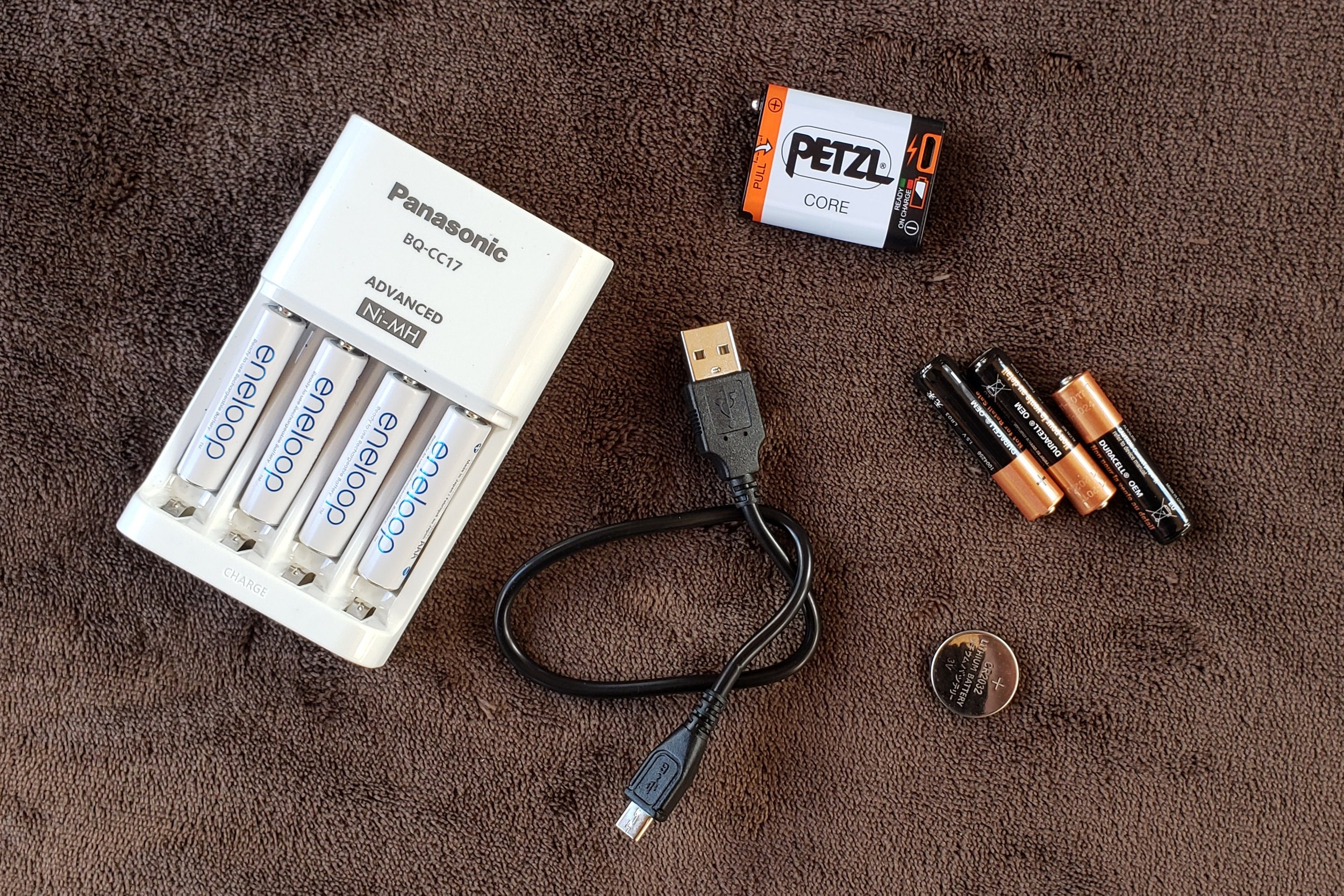 Rechargeable batteries, standard triple a batteries, and the Petzl Core battery