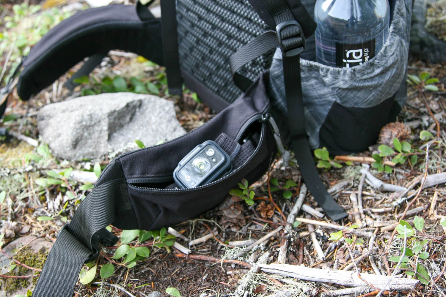 Black Diamond Spot 350 headlamp inside a backpack hipbelt pocket