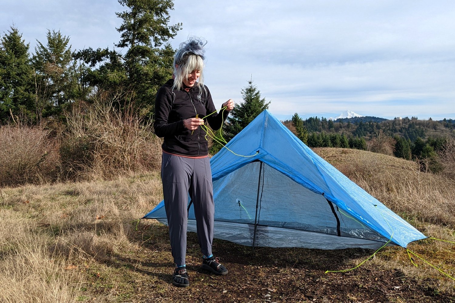 A hiker setting up the Zpacks Plex Solo