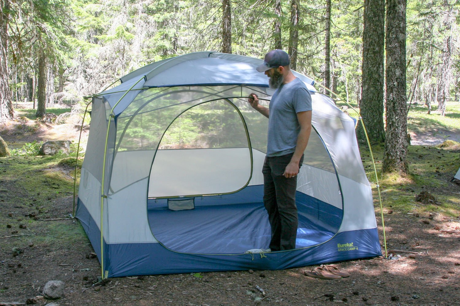 Inspecting the Eureka Space Camp 4 tent before a camping trip