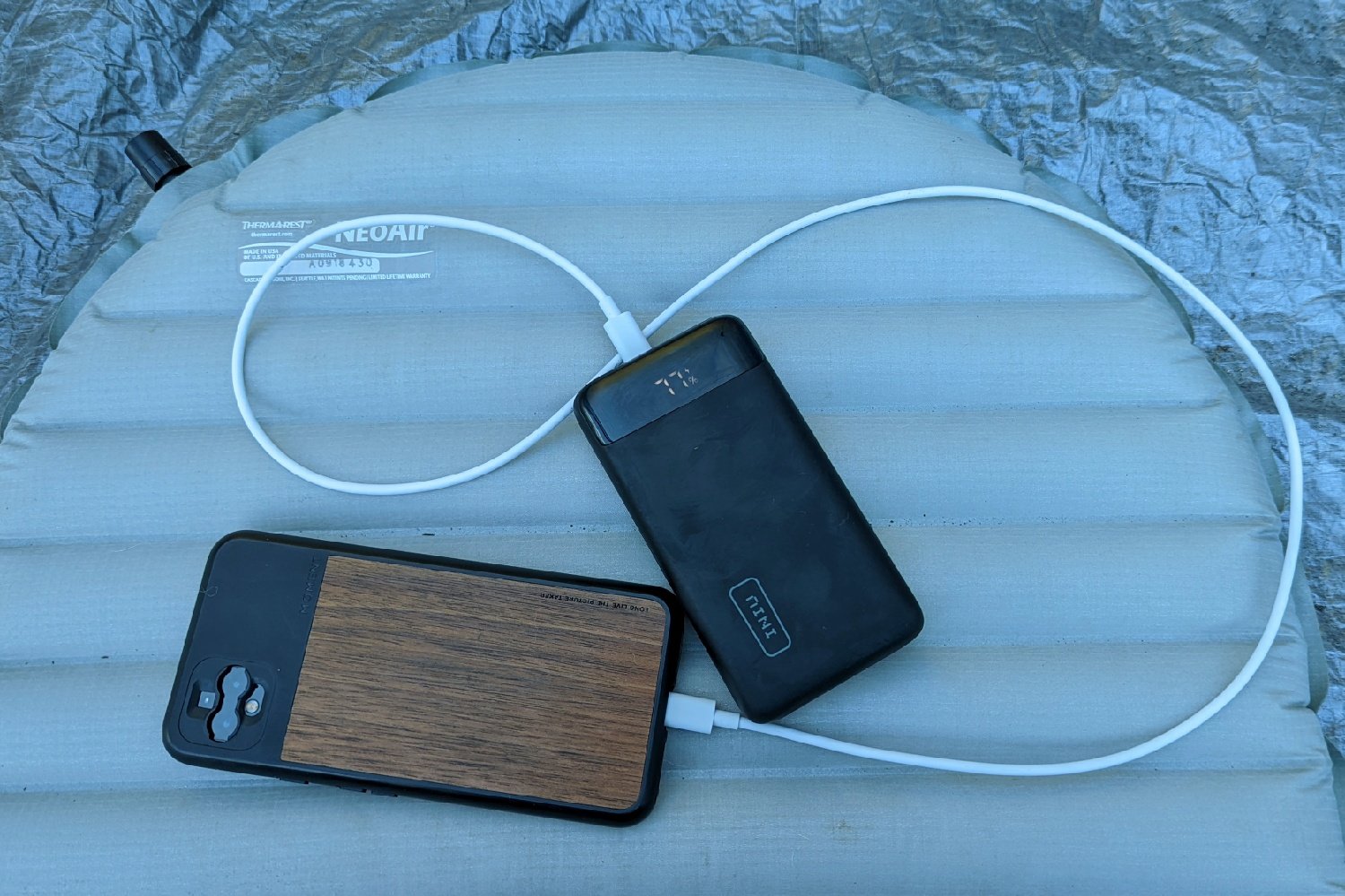 The Iniu 20000 PD power bank being used for camping