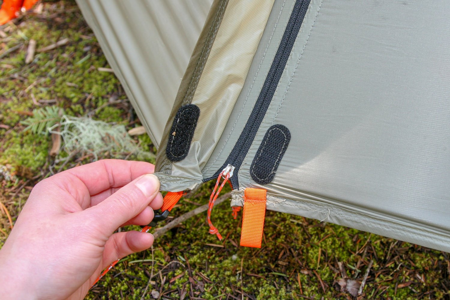 Closeup of the tent fly zipper on the REI Quarter Dome SL2 tent