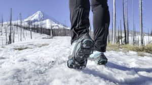 A hiker wearing the Hillsound Flexsteps with trail running shoes