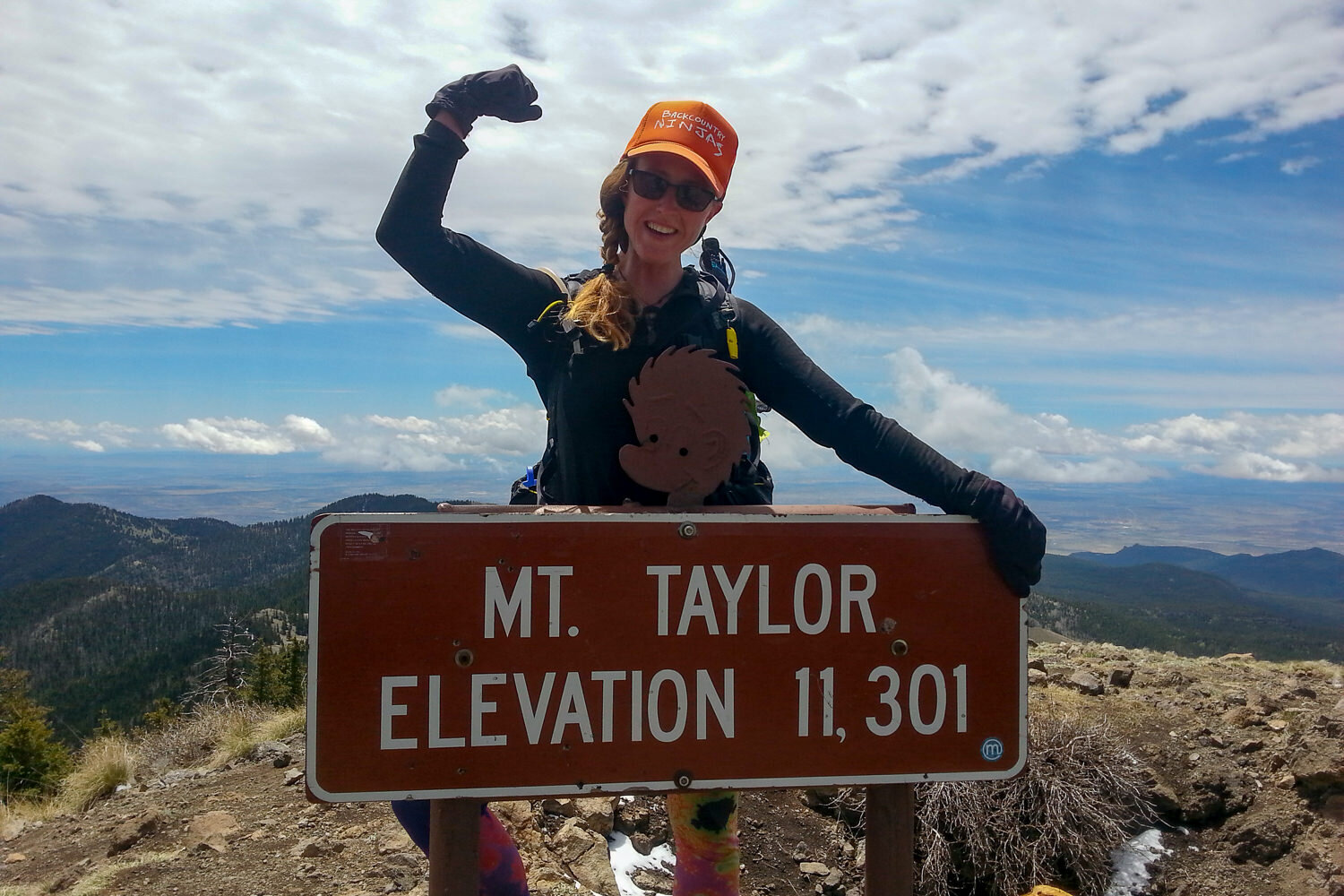 Celebrating at the top of Mt. Taylor in New Mexico