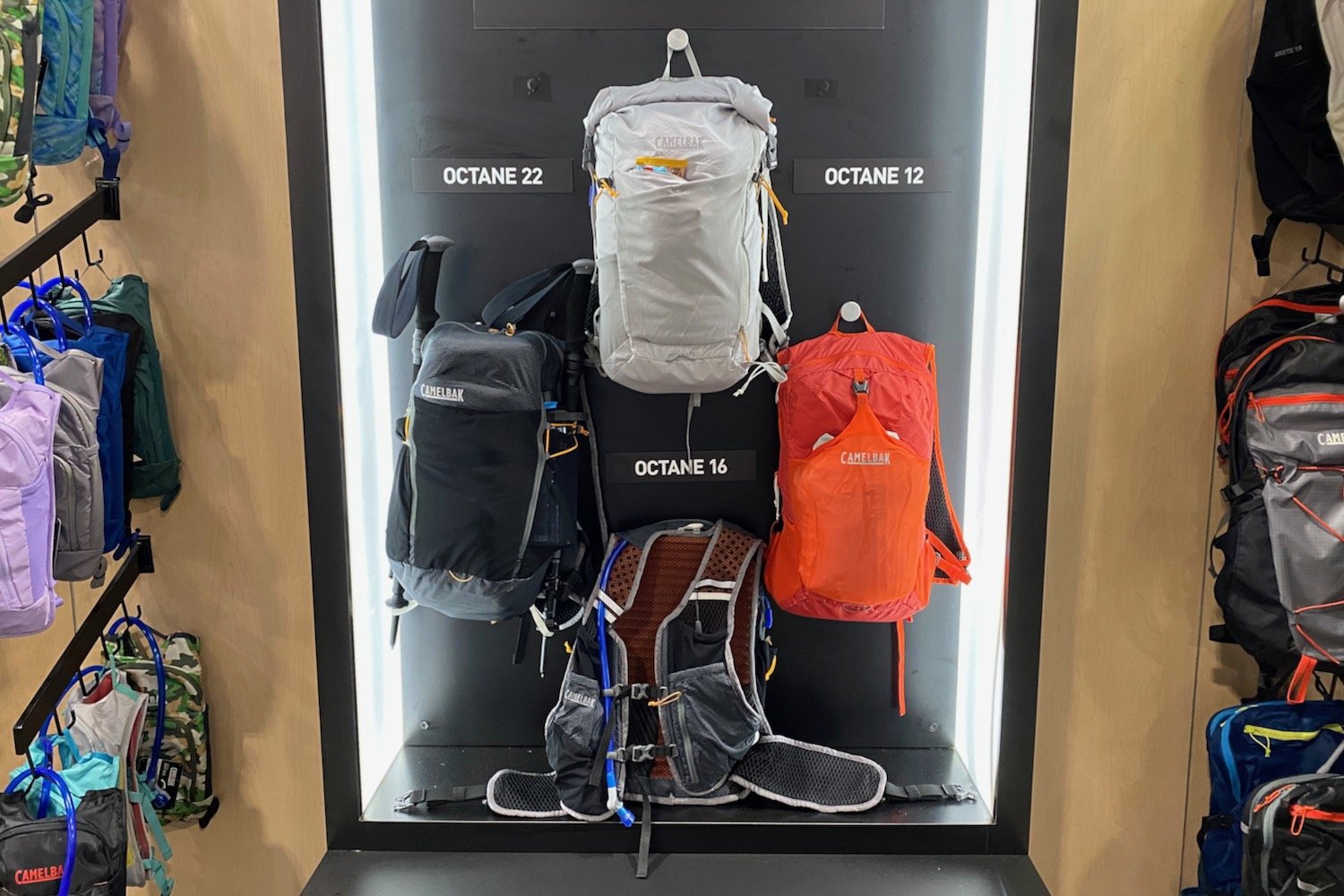 Camelbak Octane 22 Octane 12 and Octane 16 backpacks hanging on a wall