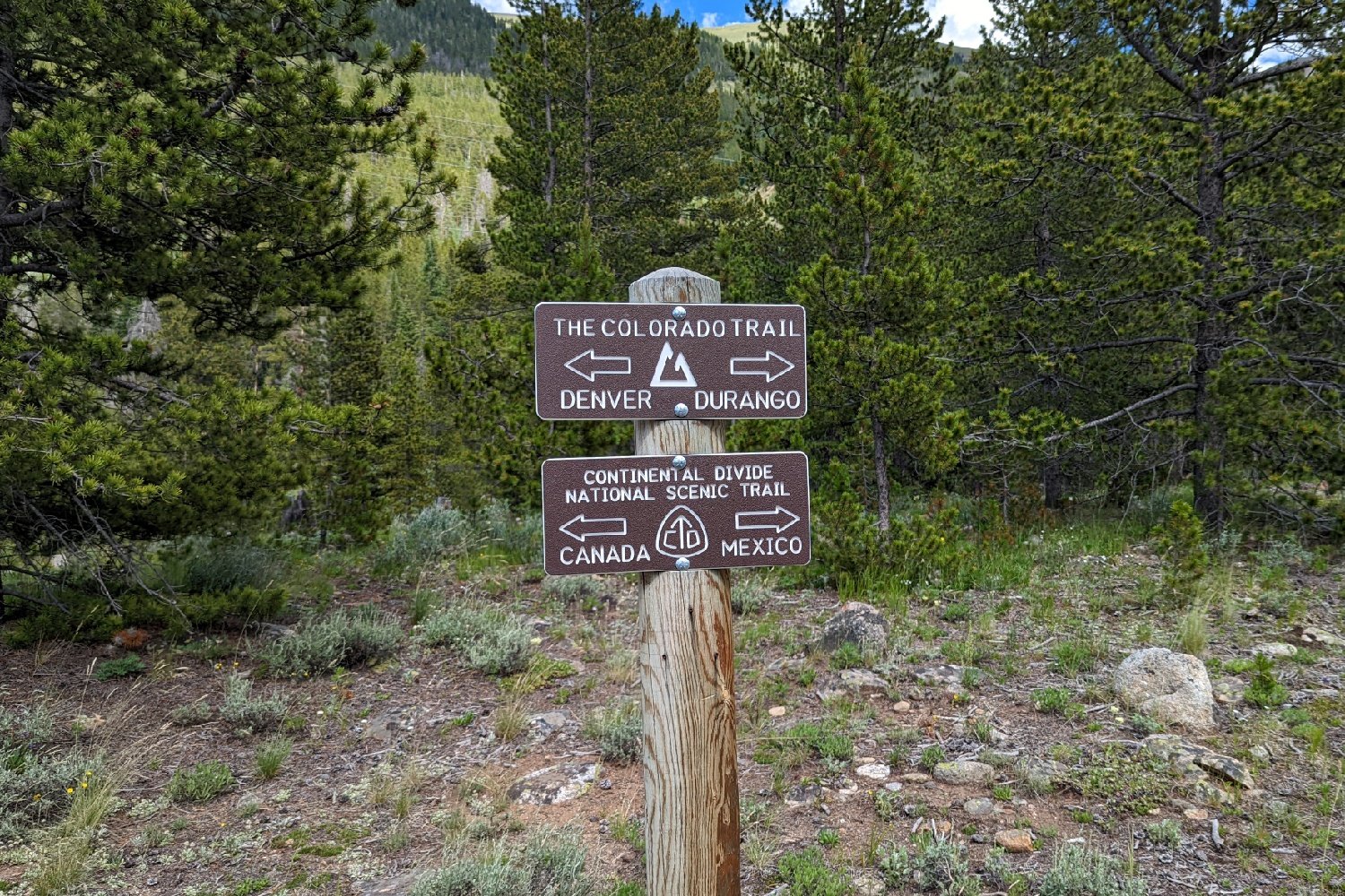 A sign pointing the way for the Continental Divide and Colorado Trails
