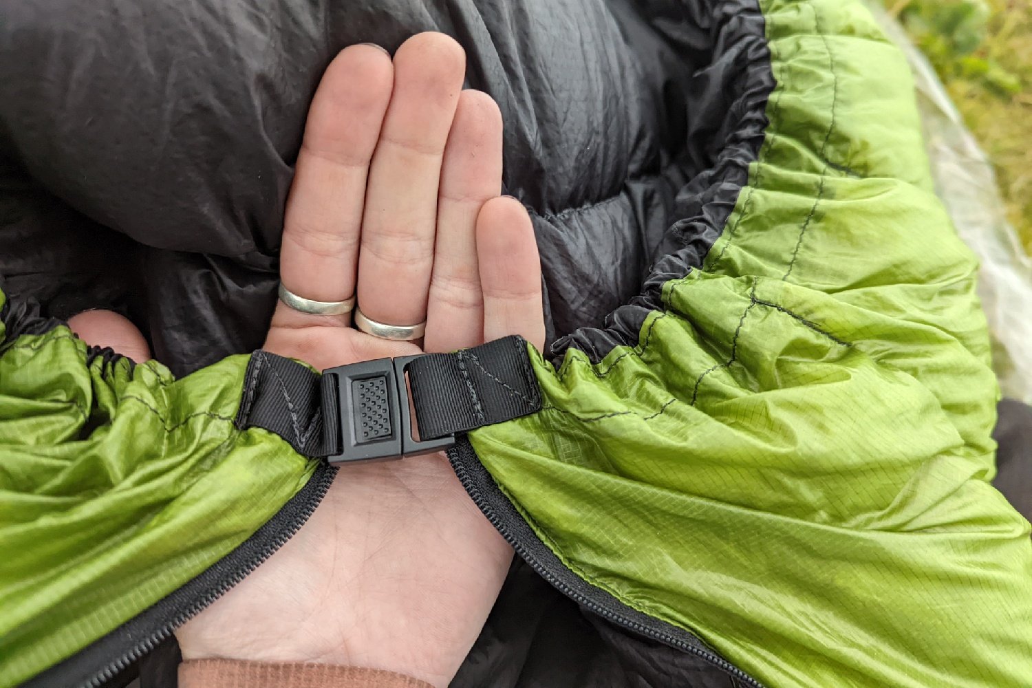 There’s a buckle near the zipper that allows you to keep the Classic around you without having to zip it up on warmer nights