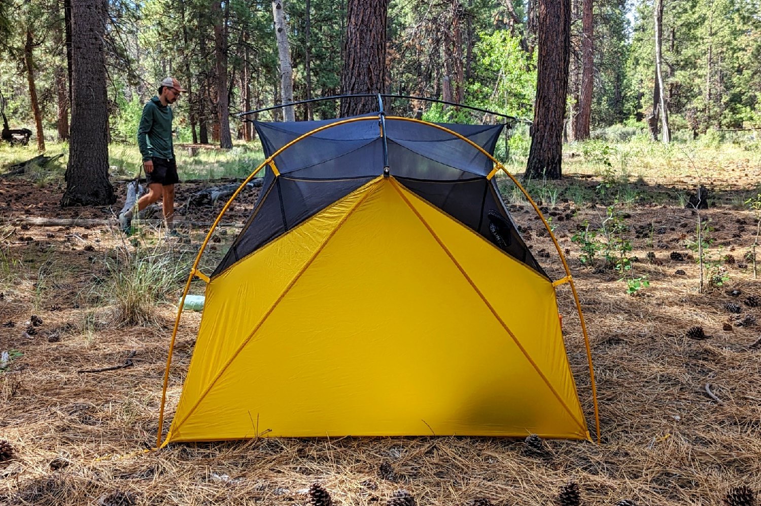 An outside view of the REI Flash 2 Tent showing the arch pole that pulls out the headwall