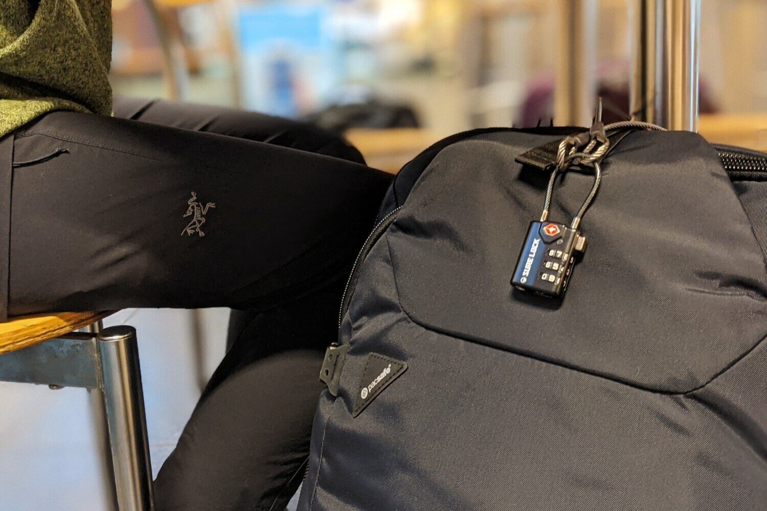 The Pacsafe Venturesafe EXP45 comes with a cable lock that can be paired with a TSA Approved Luggage Lock to secure your bag to a table or chair.