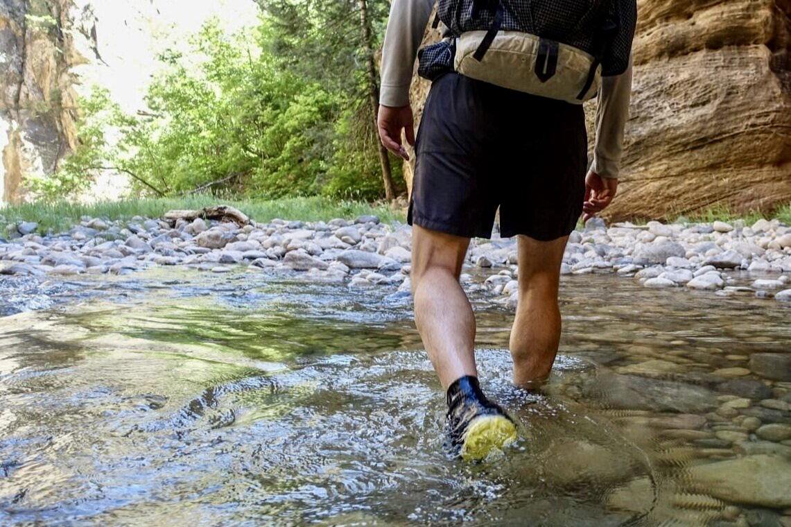 Fording the Zion Narrows in Altra Lone Peaks