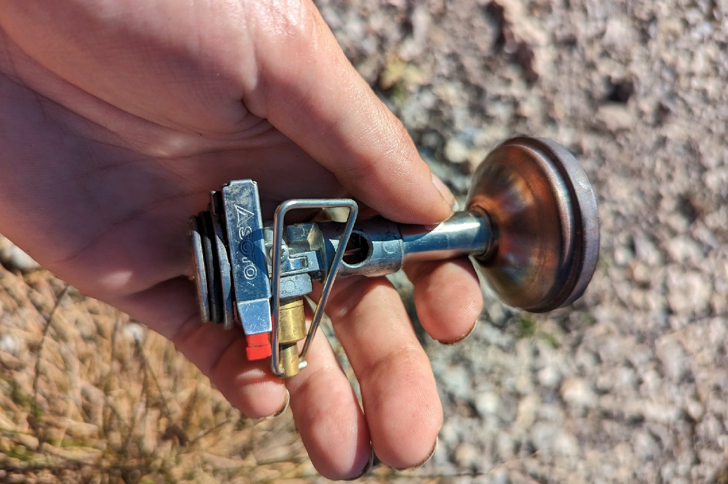 closeup look at the piezo push button ignitor on the SOTO Windmaster stove