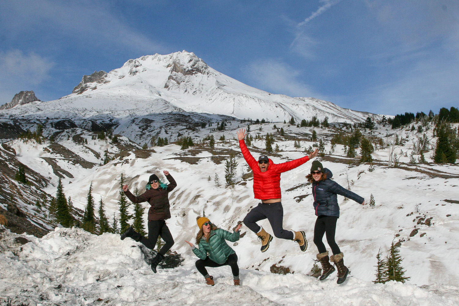The whole Cleverhiker gang rocking some of our favorite down jackets on Mt. Hood