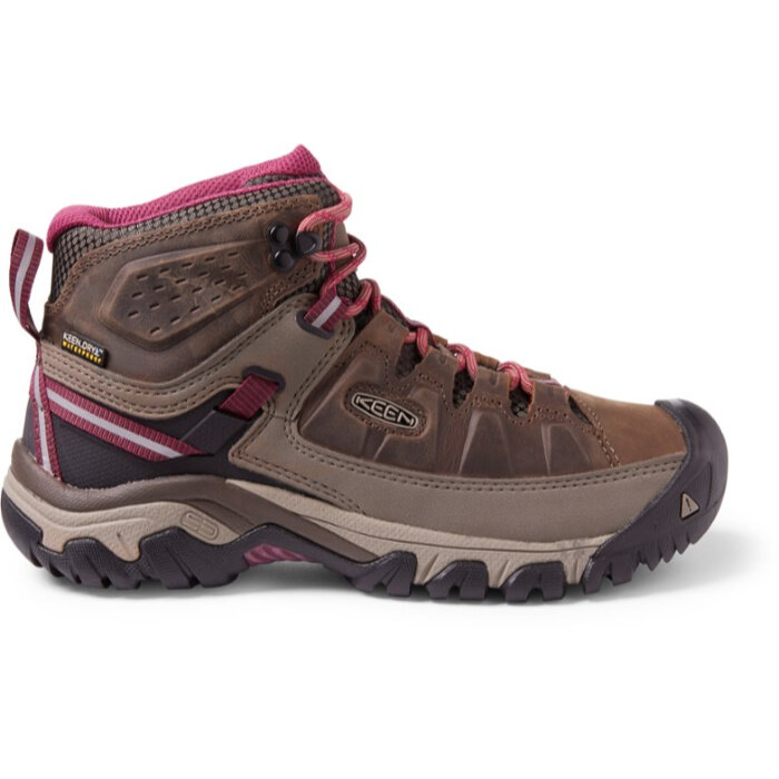 Brown hiking boot with pink accents