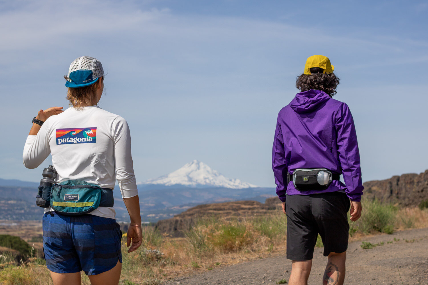 The Patagonia Houdini (men’s / women’s) is perfect for runners because it packs down small enough to fit in a fanny pack