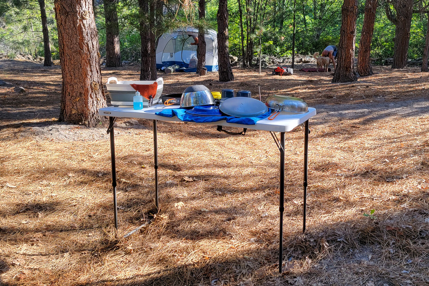 The Lifetime Camping and Utility Folding Table works great for cooking, washing dishes, dining, and more
