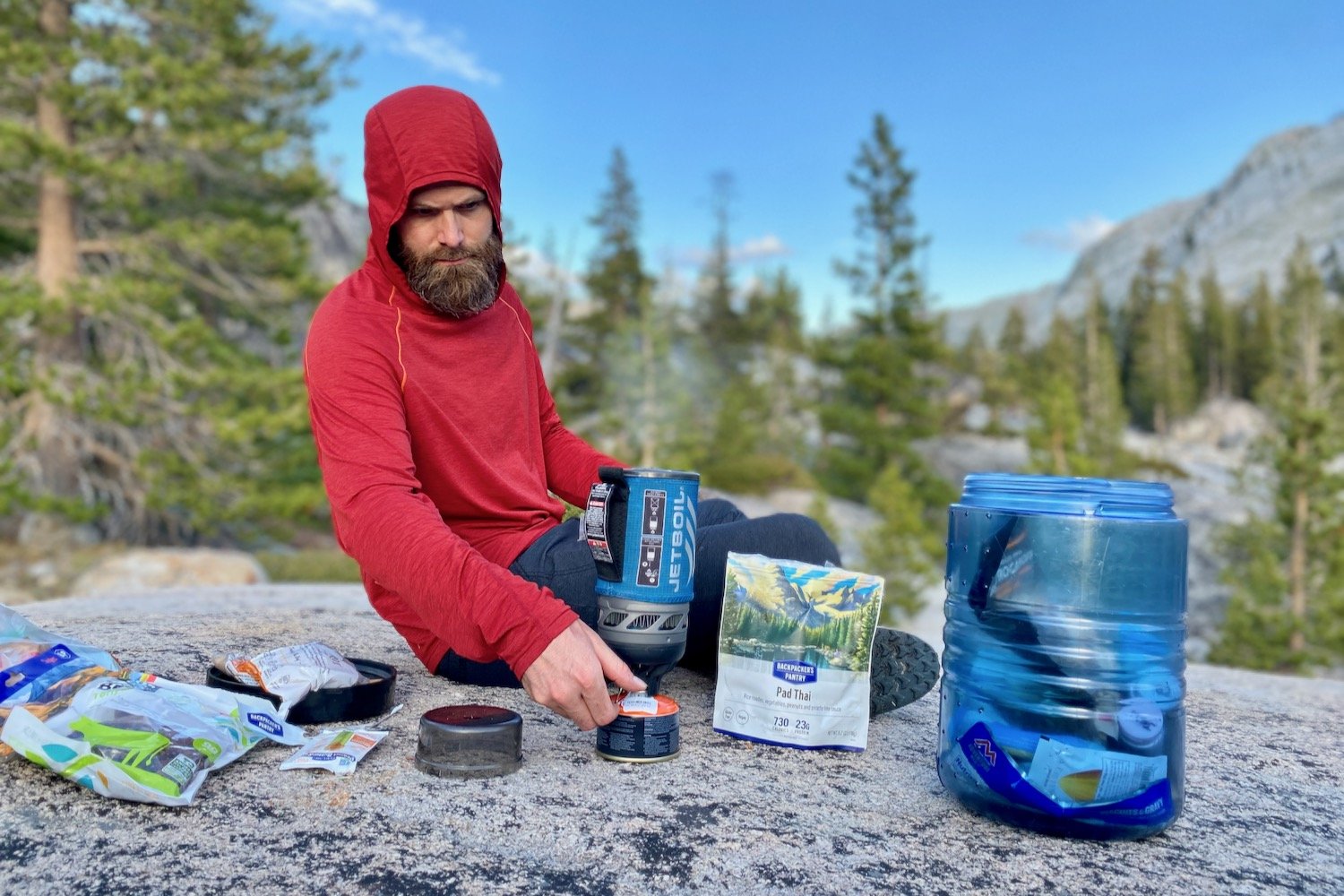 A hiker using a Jetboil Flash to cook food in Yosemite