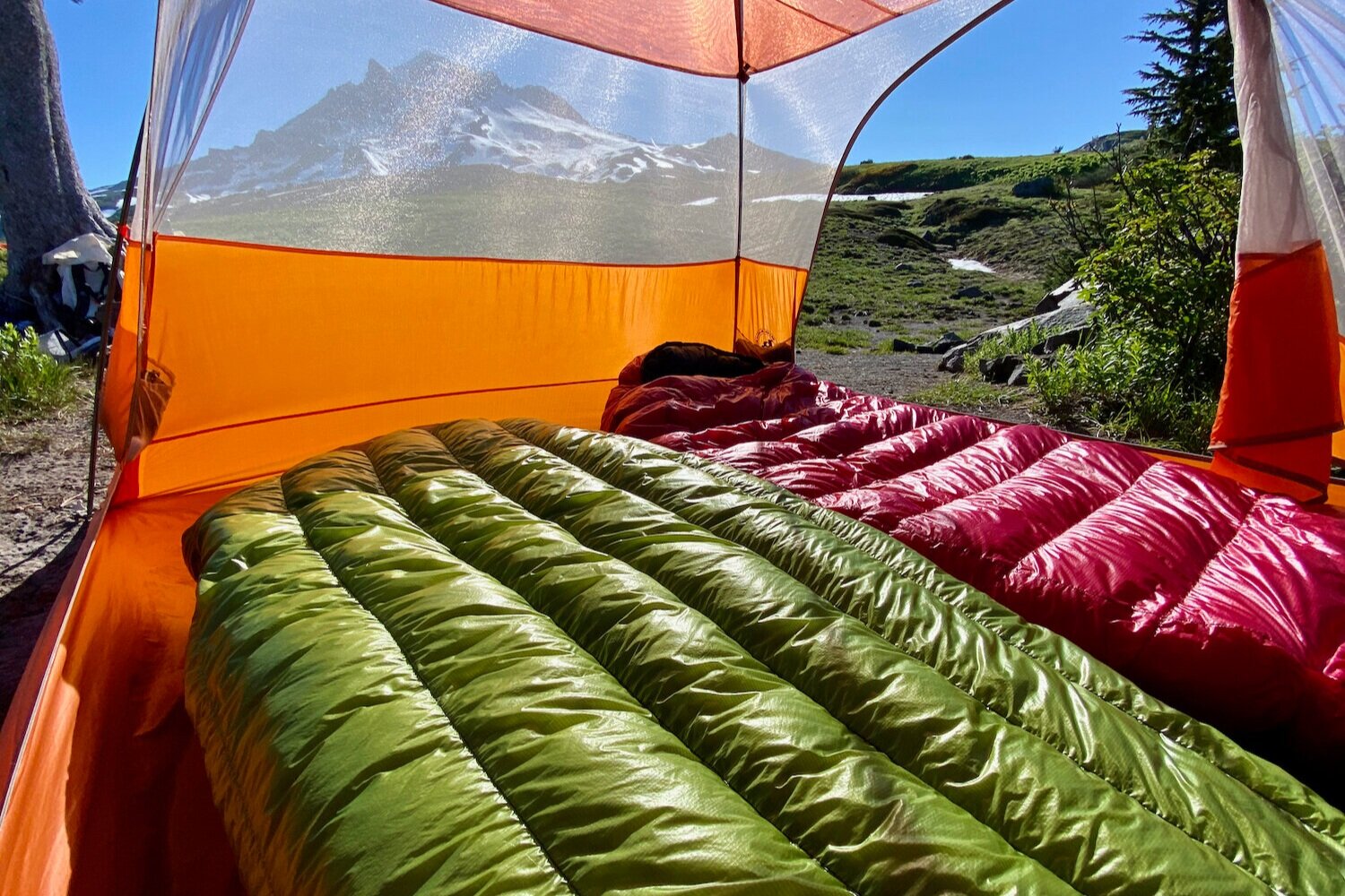 The ZPacks Classic Sleeping Bag (left) and the Western Mountaineering Alpinlite 20° (right) are some of our favorite ultralight sleeping bags.