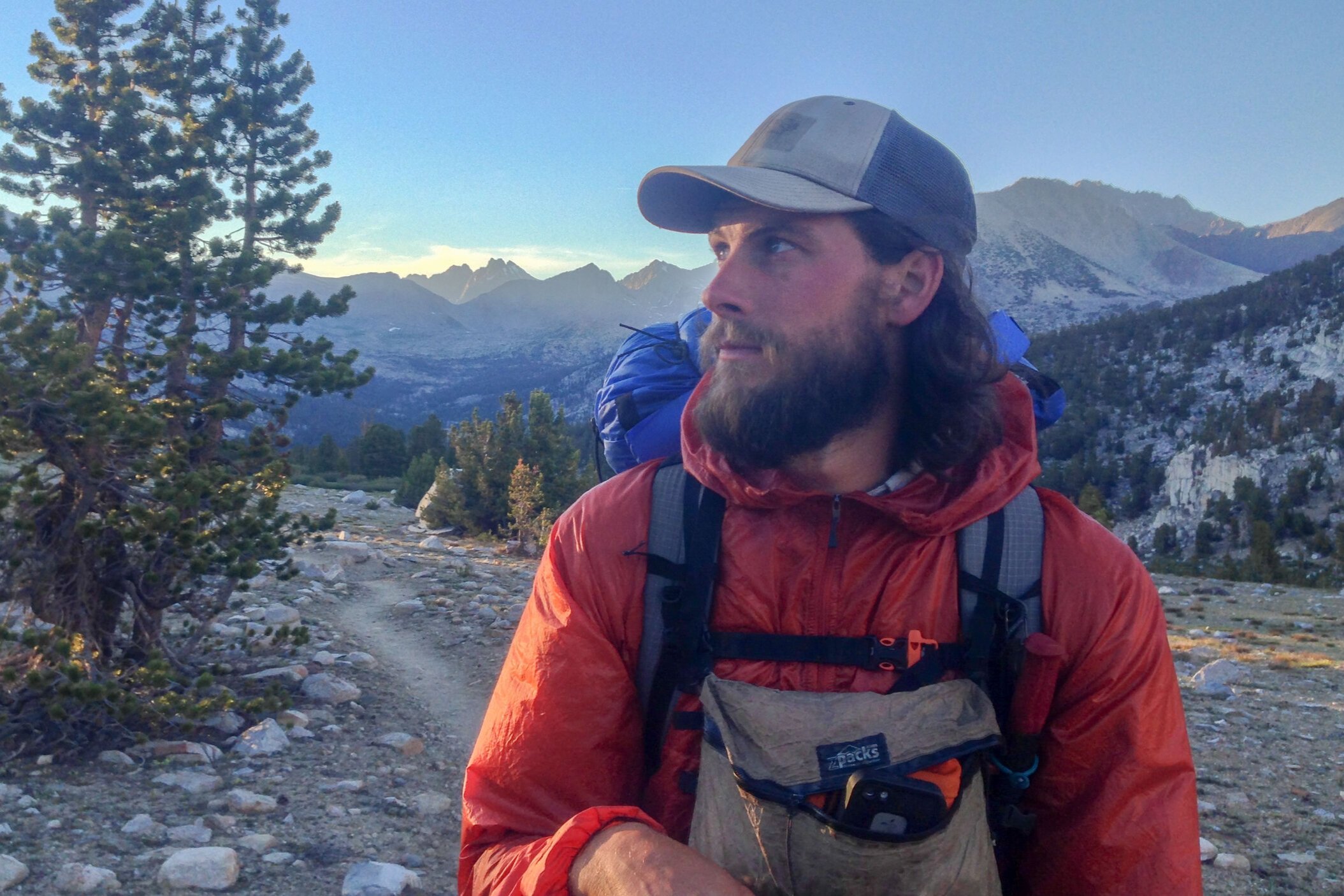 a Wind shirt keeps wind from stripping your body heat when hiking in high alpine country