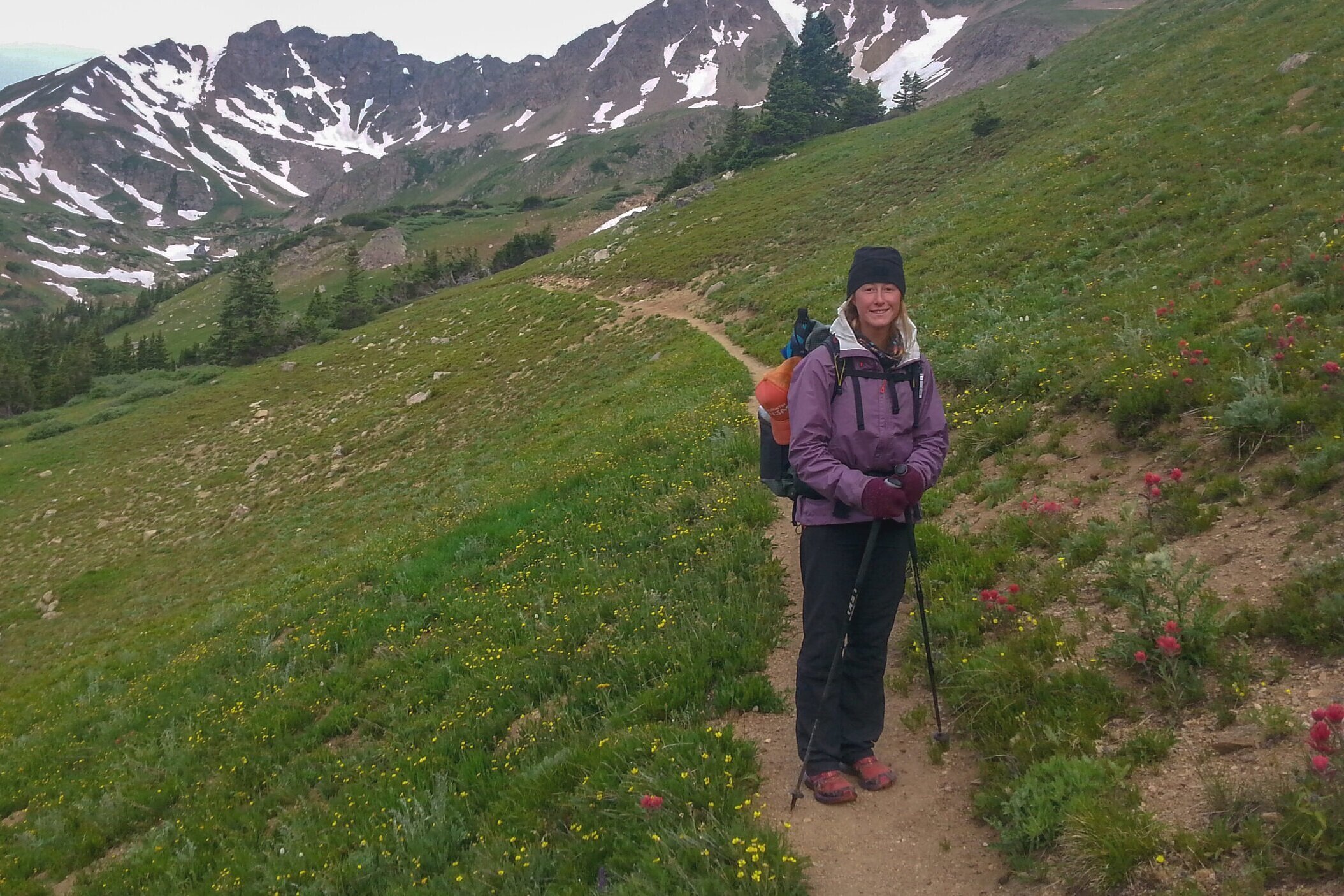 A rain jacket is essential to your backcountry clothing system year-round