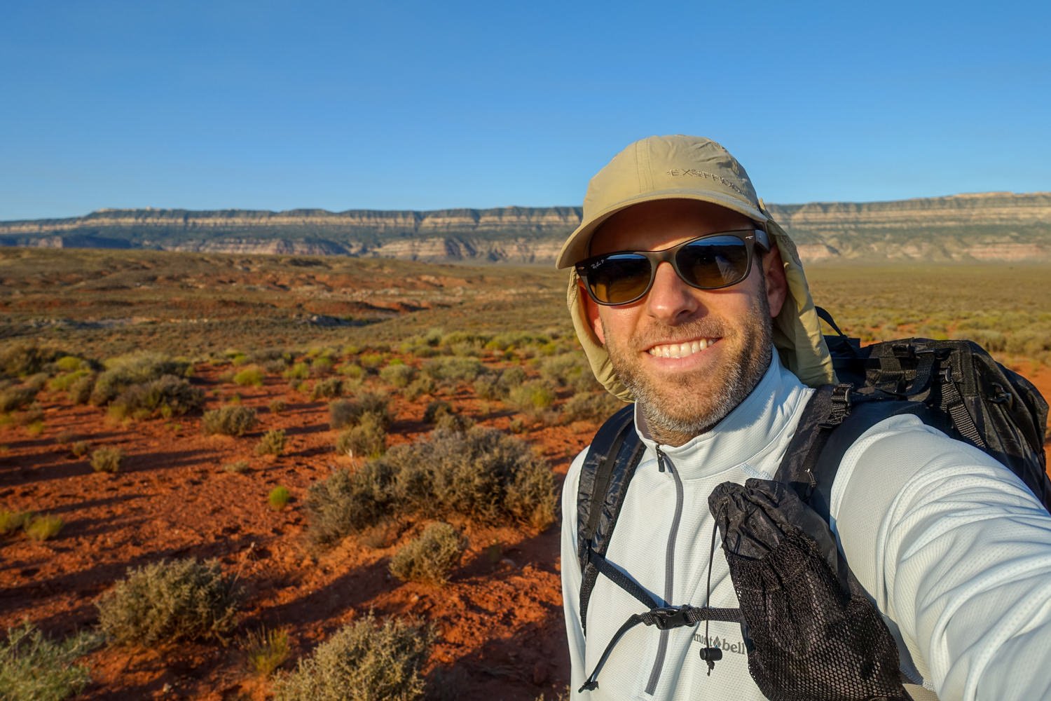 A backpacker hiking Coyote Gulch