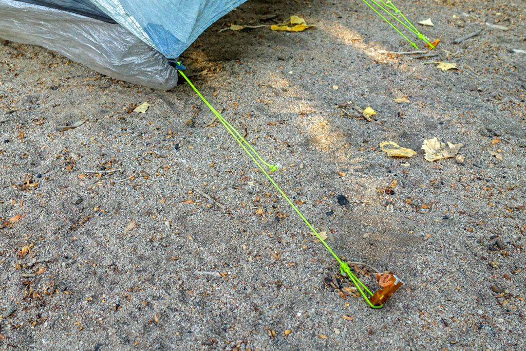 A tent stake at the corner of the Zpacks Duplex