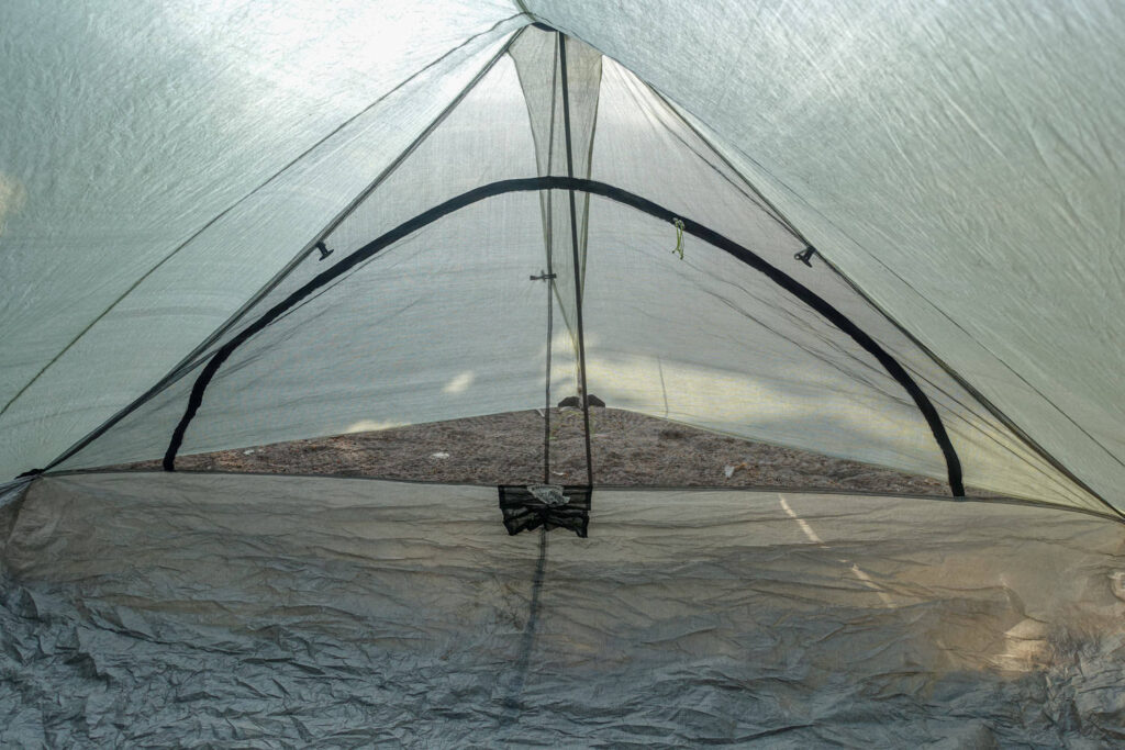 The inside of the Zpacks Duplex tent showing the interior zippered door and inside the vestibule