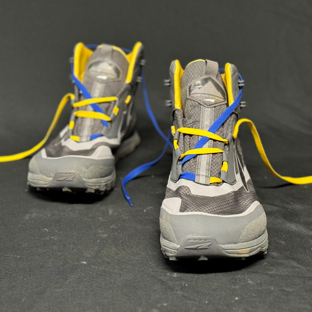 Dual-colored shoelaces demonstrating toe lacing on the men's Altra Lone Peak ALL-WTHR Mid hiking boots