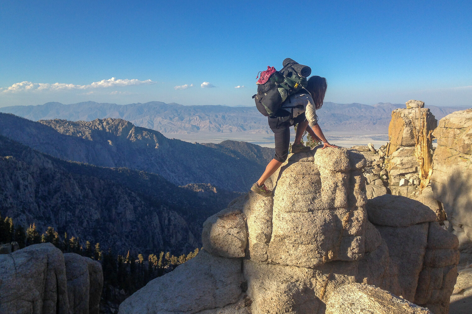 Climbing up on some rocks to get an amazing view of the the desert valley in Southern California