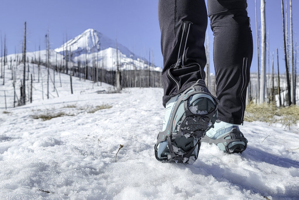 A hiker wearing the Hillsound Flexsteps with trail running shoes