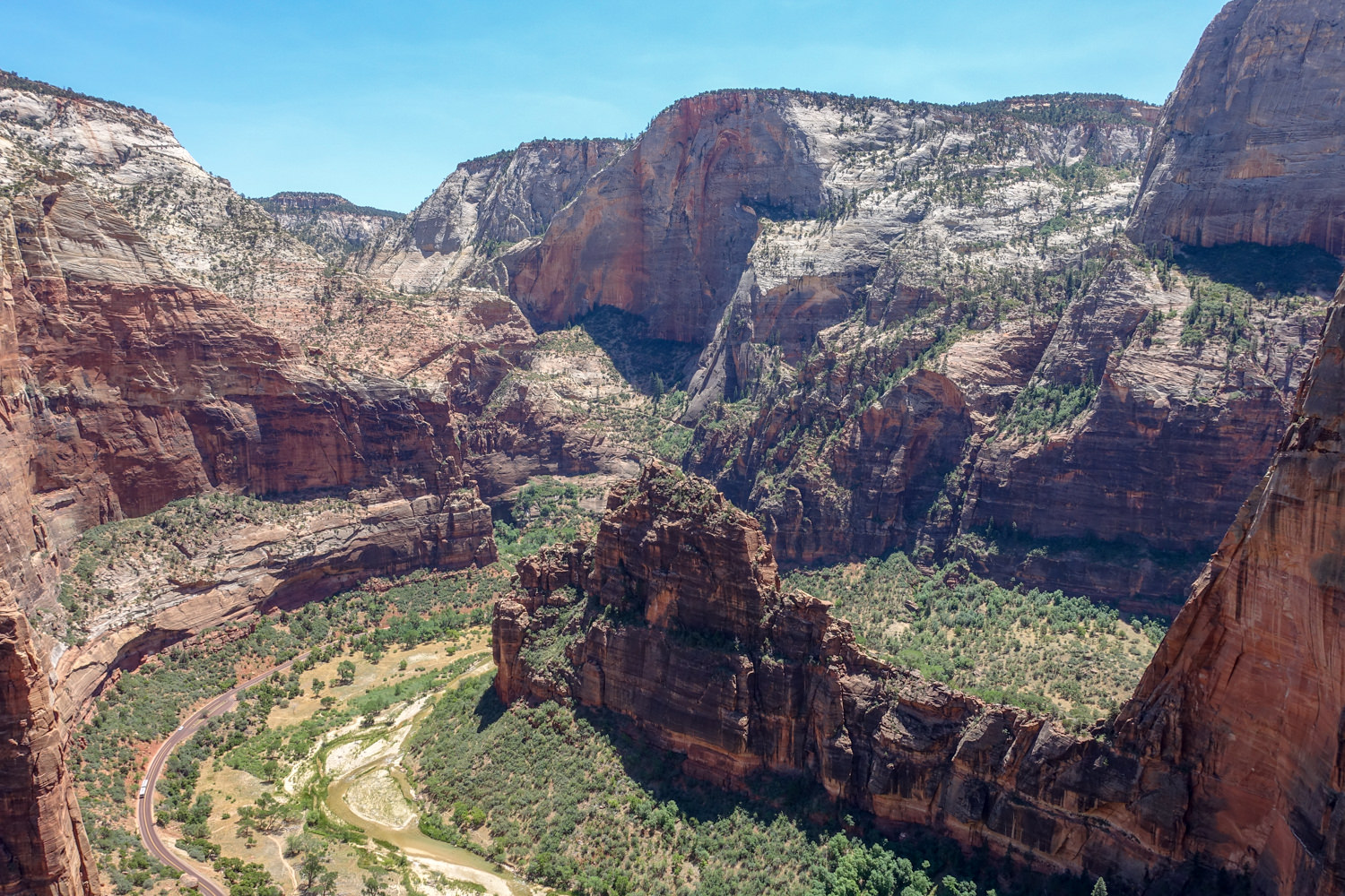 the road and river that winds through zion canyon