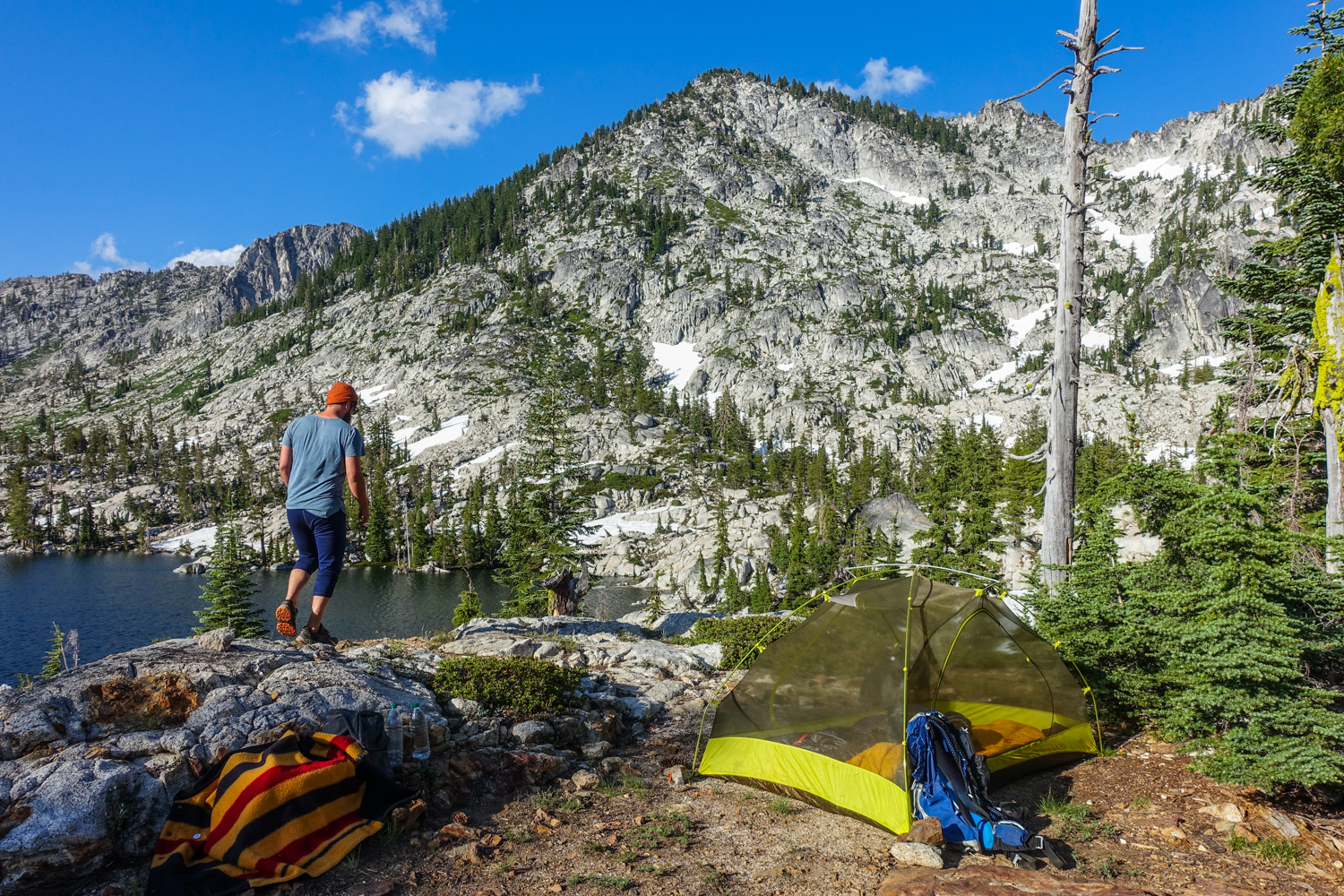 backpacker in his camp site in the trinity alps wilderness