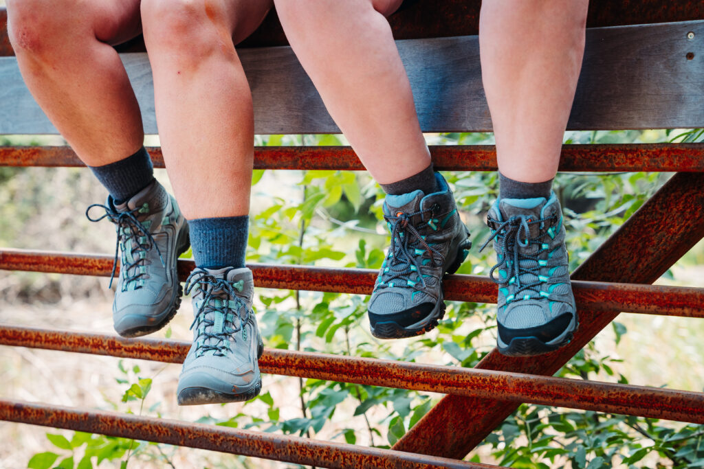 Two hikers wearing the Keen Targhee IV WP and Merrell Moab 3 WP Women's Hiking Boots