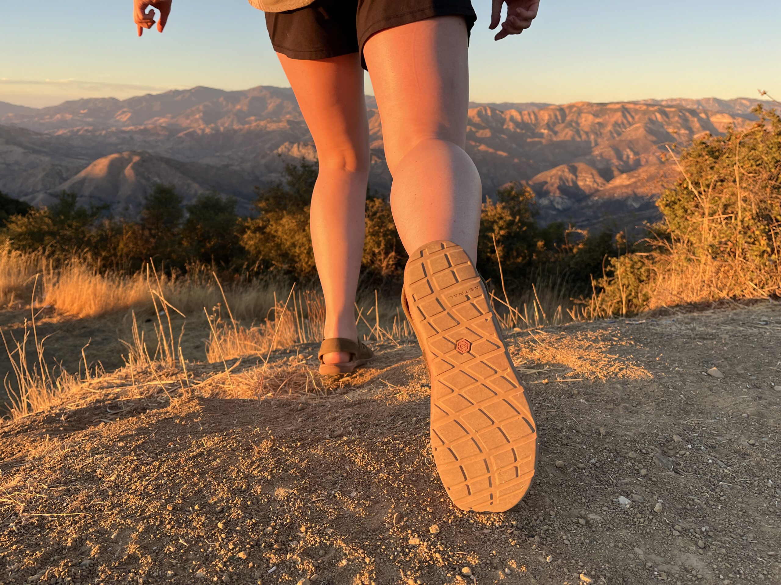 Our tester wearing the Astral Webber sandals on a hike.