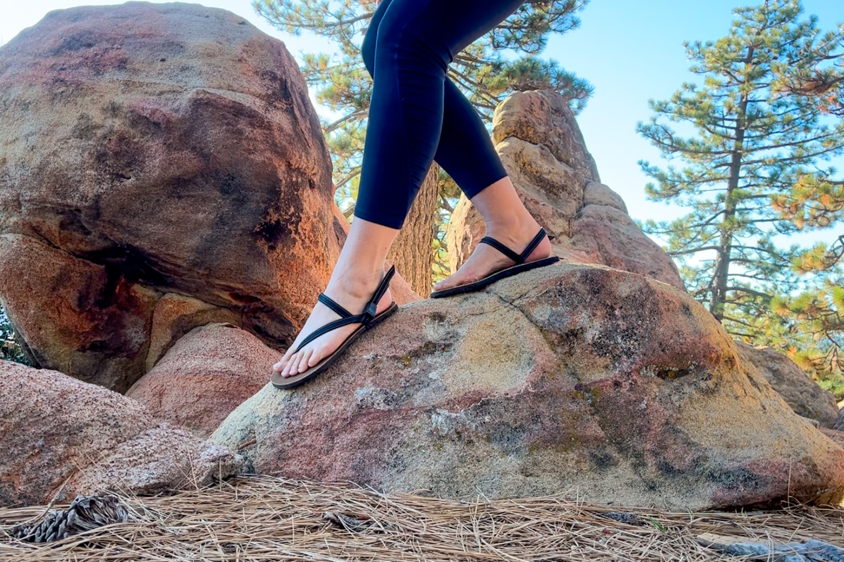Our tester wearing the Earth Runner Alpha sandals on a hike.